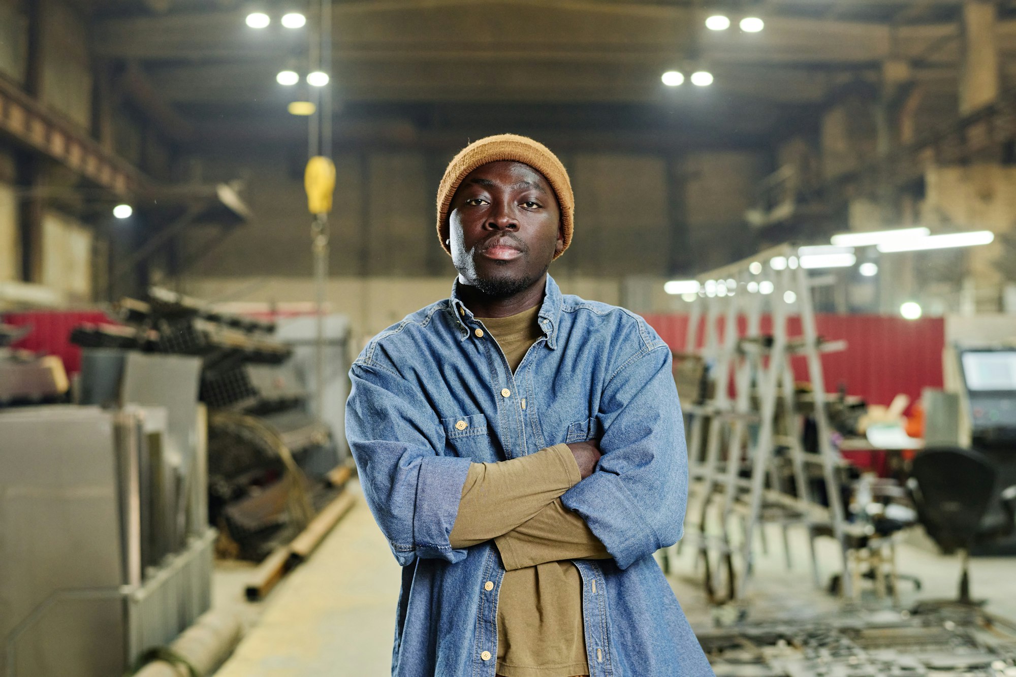 African worker standing in factory